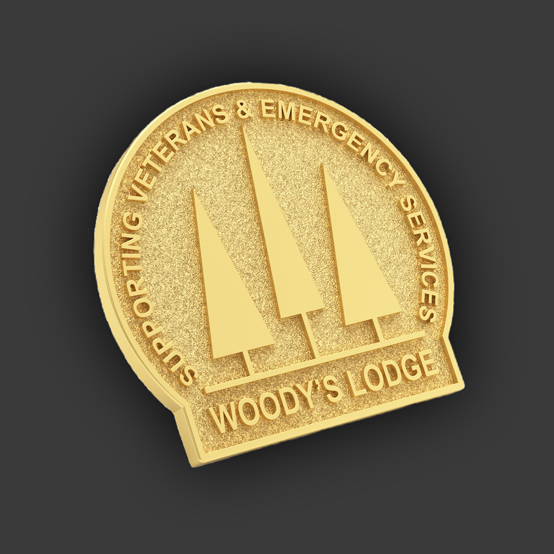 image of a lapel badge produced for Woody's Lodge Charity by Selcraft UK Ltd