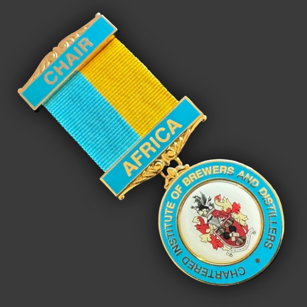 Gilt and enamel medal of office on a neck ribbon, made by Selcraft