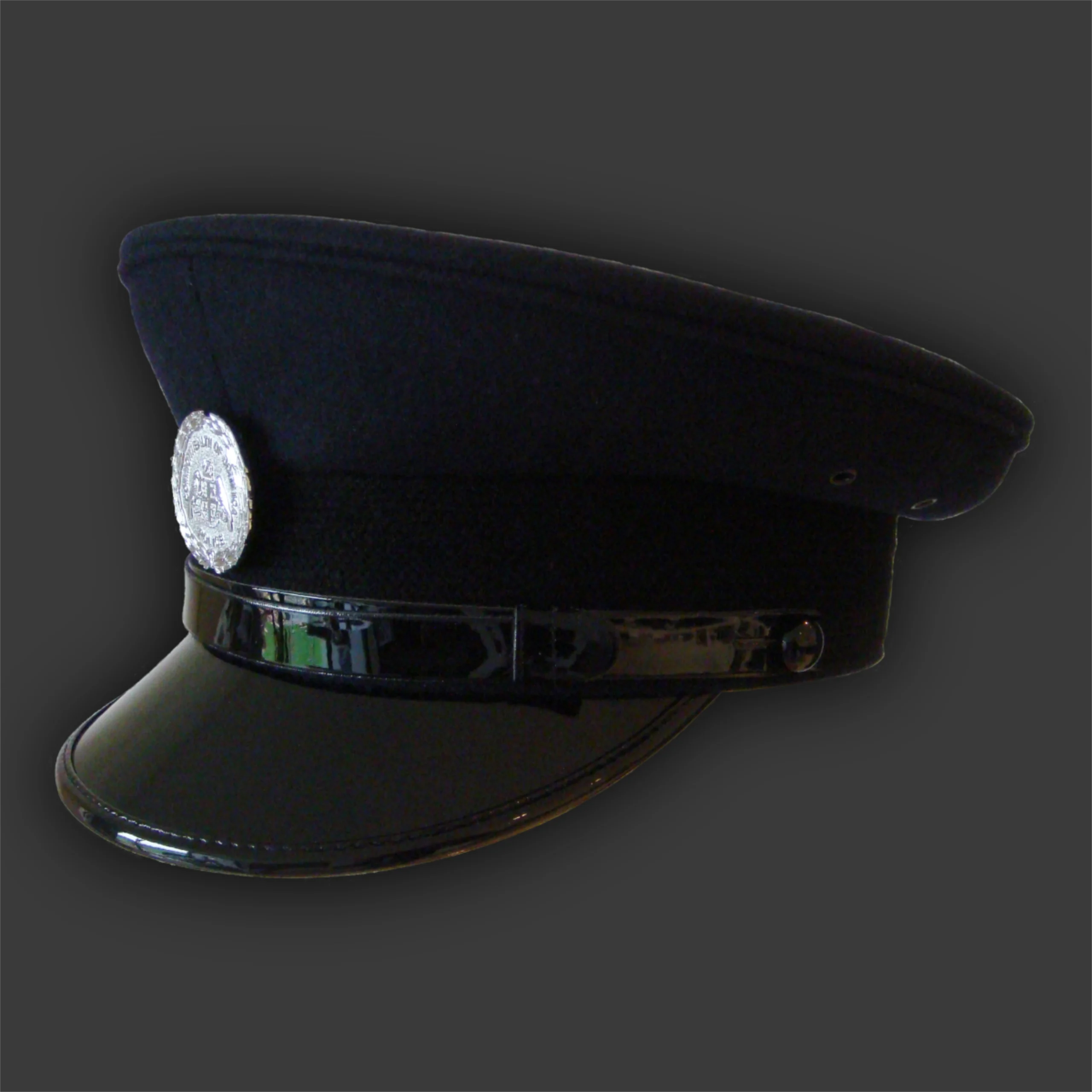Image showing Commonwealth of Dominica Police Peak Cap Side View